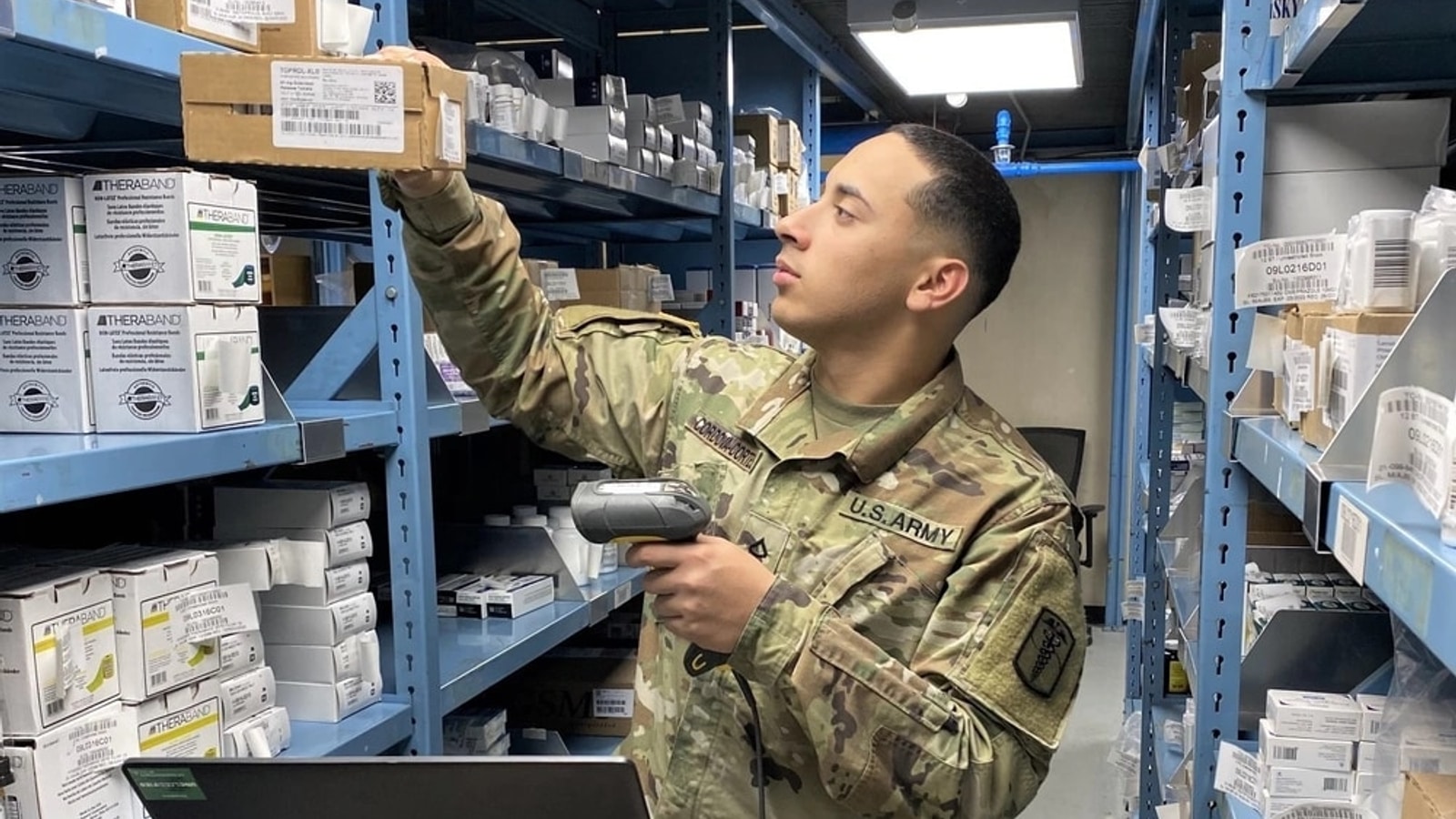 Medical logistics specialist working in a military medical supply warehouse