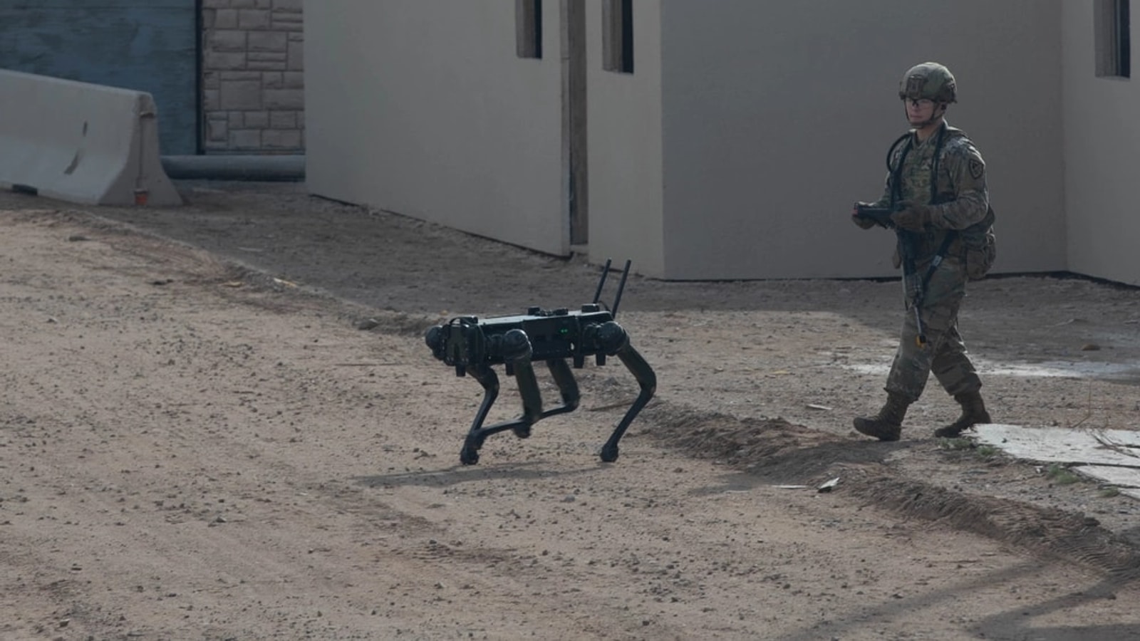 Soldier operating a quadruped robot during a human-machine integration experiment