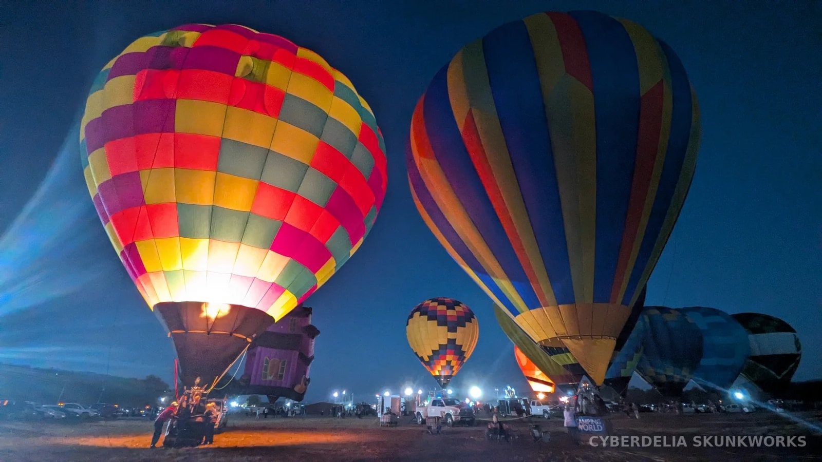 Balloon glow against the deep-blue Oklahoma evening.