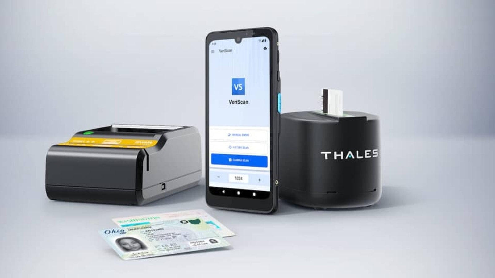 ID scanning hardware, a phone showing the VeriScan interface, and sample identity cards in IDScan.net product media