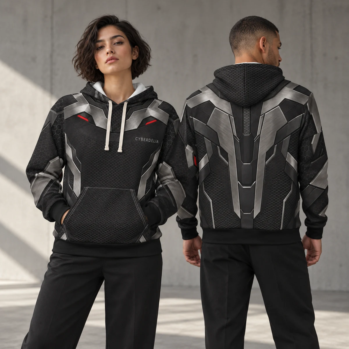 Two models illustrate the Iron Vector front and back artwork together against an industrial wall.