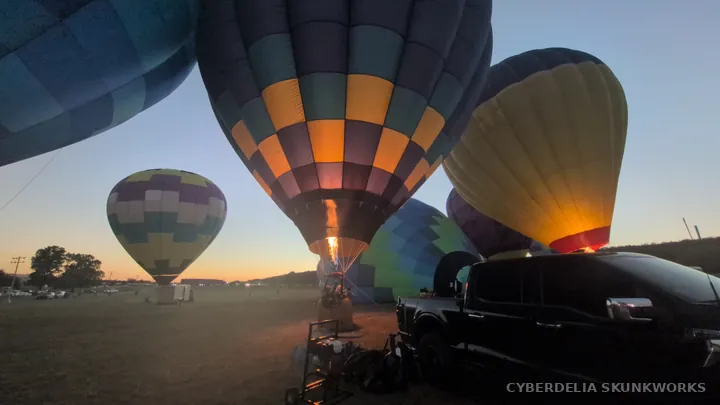 Baskets, support vehicles and balloons share the working field.