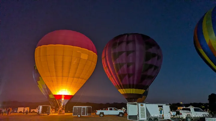 An orange balloon lights up beside a purple envelope.