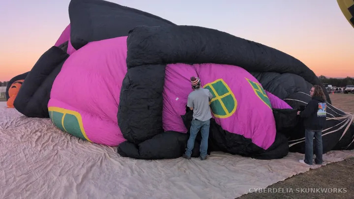 Crew members work beside the special-shape envelope.